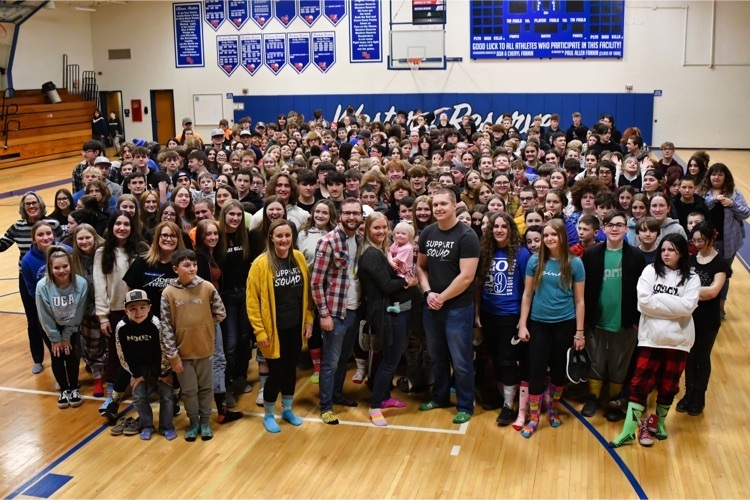 middle school and high school students supporting Downs Syndrome Day