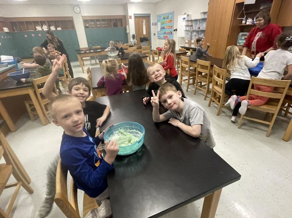 students making green Play-Doh