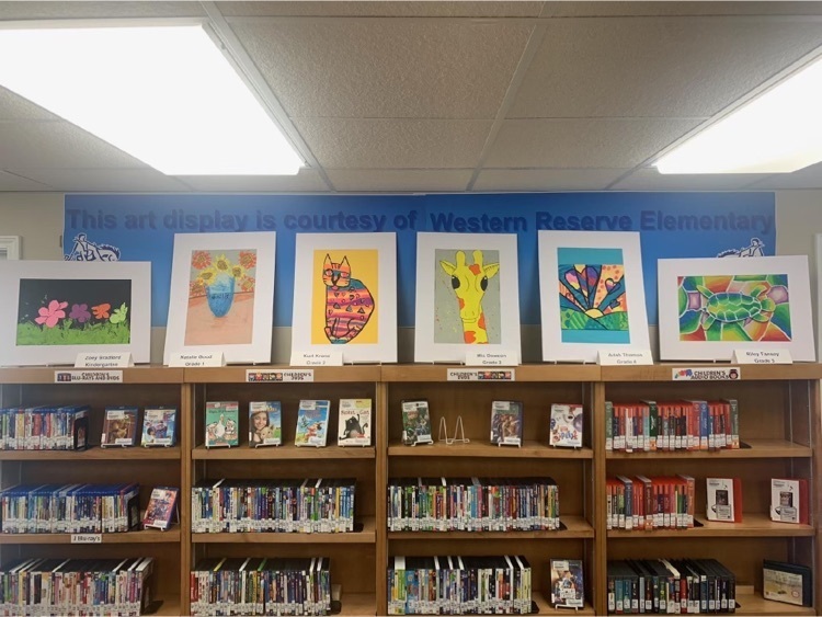 Student artwork displayed at the local library.