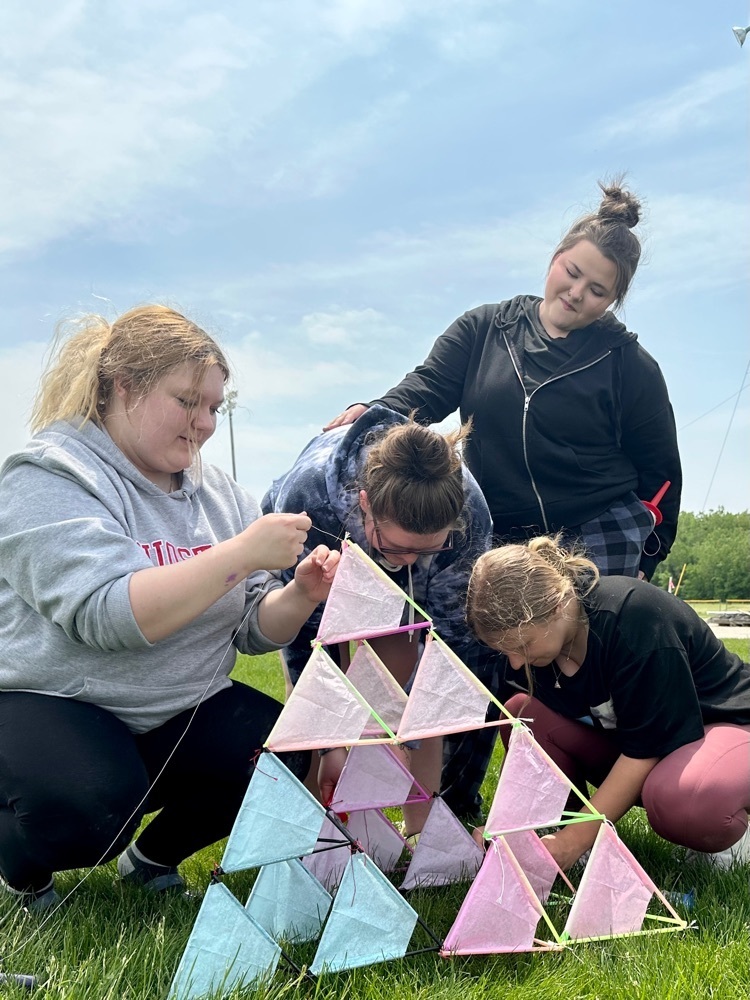 HS geometry students flying kites.