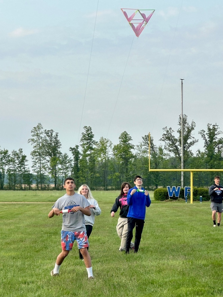 HS geometry students flying kites.