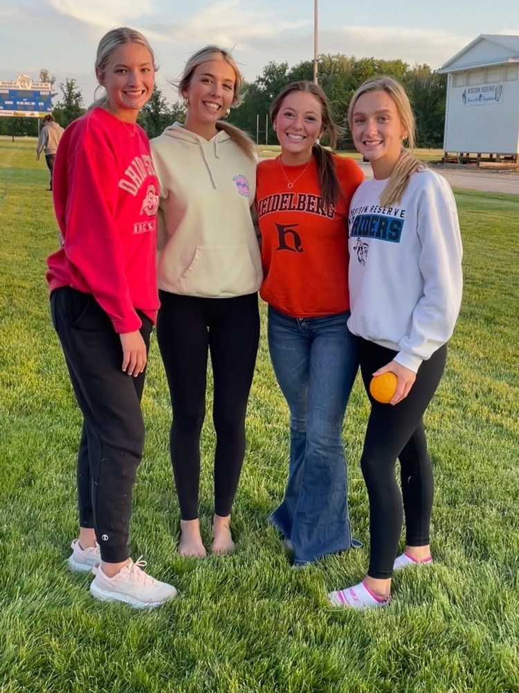 Seniors at their get together on the football field.